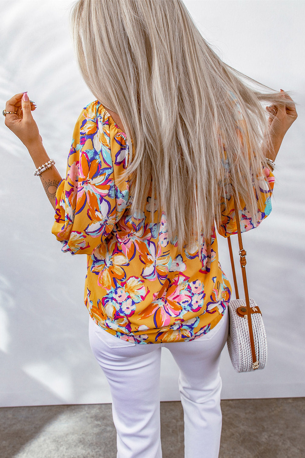 Noa | Oranje Bloemenprint Blouse met Elastische Halslijn